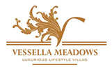 Vesella Meadows logo: a serene landscape with rolling hills and a flowing river.